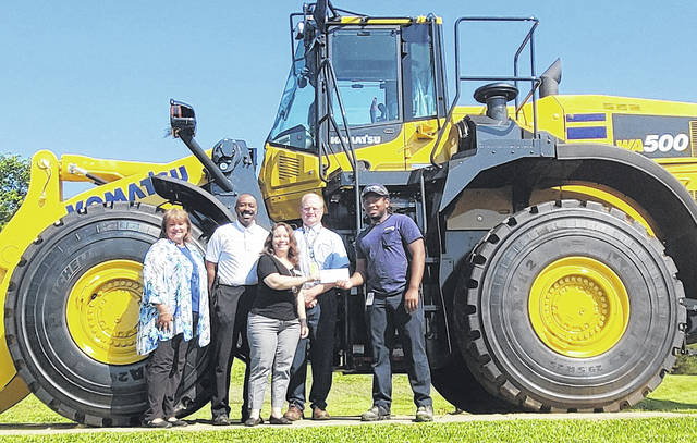 Representatives from Komatsus Newberry plant give a $1,000 donation to Newberry County First Steps, part of the Komatsu Feeding America campaign. Pictured, left to right, Regina Eargle, Clyde E. Hill, Sarah Eargle, Don Russell, Chris Williams.
Courtesy of Komatsu