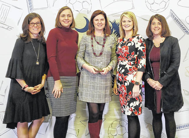 Mid-Carolina Middle School was recently named a School to Watch by the National Forum to Accelerate Middle-Grades Reform. Pictured, left to right: Emily Owen, eighth grade social studies; Beverly Wood, assistant principal; Deedee Westwood, principal; Jessica Beam, curriculum coordinator; Kerry Frick, eighth grade math and algebra one.
                                 Courtesy photo