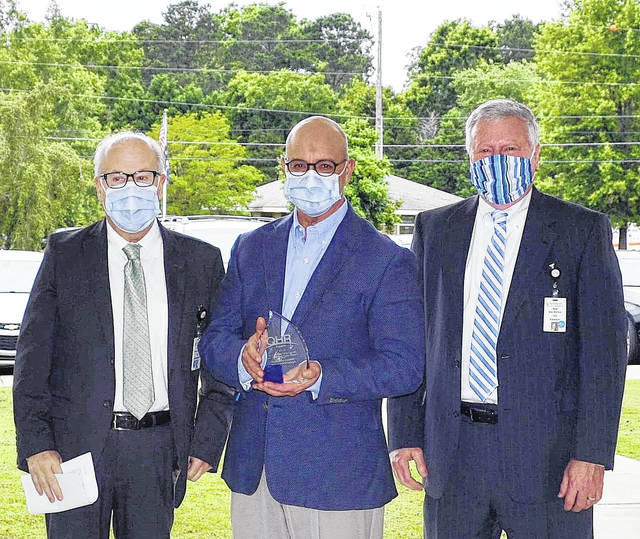 This year, during the Quorum Health Resources annual awards dinner, Newberry County Memorial Hospital received an award for the Best Overall Performance for a hospital with net revenues under $100 million. Pictured, left to right, Bruce Baldwin, CEO, Dr. Jerry Alewine, board chairman, and Bob Hetrick, CFO. Courtesy photo