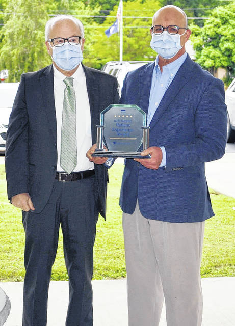 For the fifth year in a row, Newberry County Memorial Hospital has achieved the Healthgrades 2020 Outstanding Patient Experience Award™. Pictured, left to right, Bruce Baldwin, CEO and Dr. Jerry Alewine, board chairman. Courtesy photo