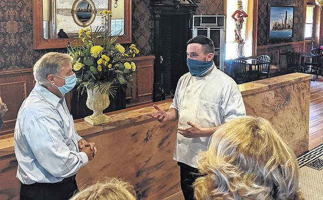 Senator Lindsey Graham speaks to Executive Chef John Worthington at Figaro the Dining Room. Andy Husk | The Newberry Observer
