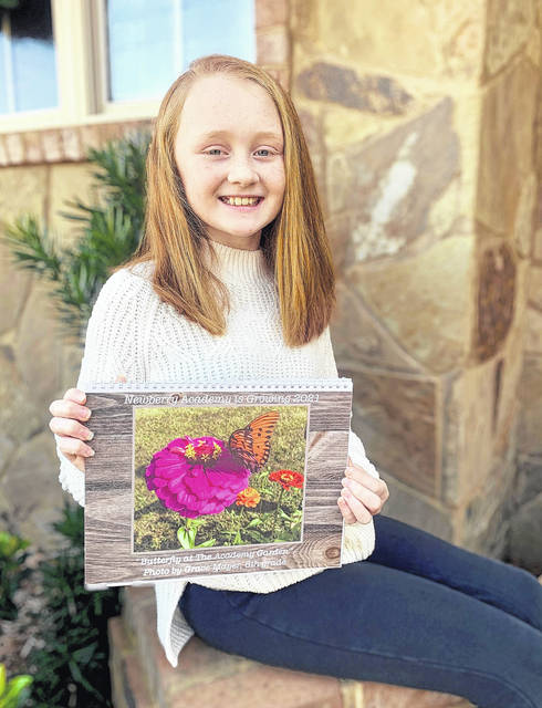 <p>The overall winner and cover feature was taken by sixth grade student Grace Mayer, the title of the piece is “Butterflies at The Academy Garden.”</p>
<p>Courtesy of Newberry Academy</p>