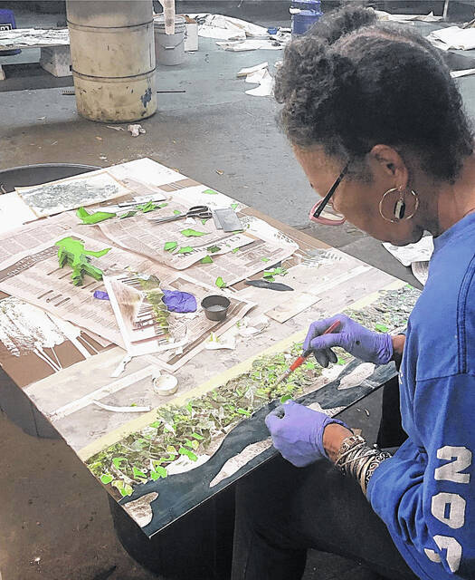 Norma Donaldson-Jenkins creates in the old pressroom of The Newberry Observer.
Andrew Wigger | The Newberry Observer