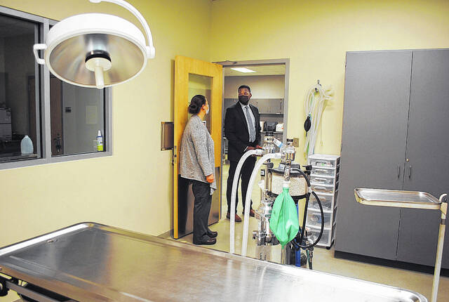 <p>Melissa Entrekin, vet tech instructor, introduces Alvin Pressley to the veterinary surgery suite.</p>
<p>Courtesy of PTC</p>