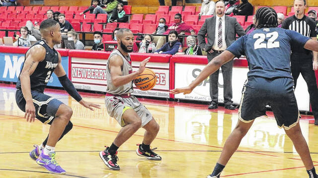 Marcus Ford put up 20 points in the first half, leading the Wolves to victory over Wingate.