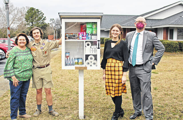 128180095_web1_IMG_4658
The Little Free Pantry at Summer Memorial Lutheran Church. Pictured are some of the people who made it possible, left to right: Norma Price, Cam Kasten, Jessica Beam, Robert Kopp.
Andrew Wigger | The Newberry Observer