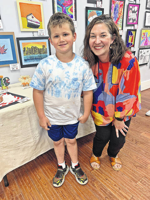 Little Mountain art instructor Jennifer Jones with first grade student, Zackery Koon.
Courtesy of NAC