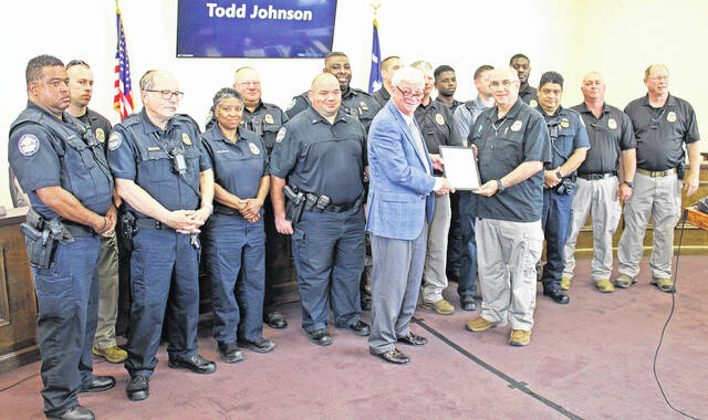 128554039_web1_IMG_5525
Vice Chair Les Hipp presents a proclamation recognizing May 11-17, 2022, as National Police Week to the Newberry County Sheriffs Office.
Andrew Wigger | The Newberry Observer