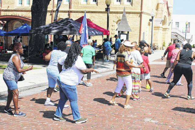 Festival goers participating in Zumba.
                                 Andrew Wigger | The Newberry Observer