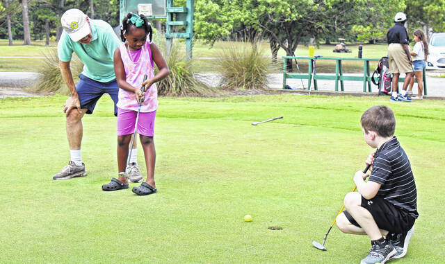 <p>Working on her short game.</p>
<p>Dylan Francis | The Newberry Observer</p>