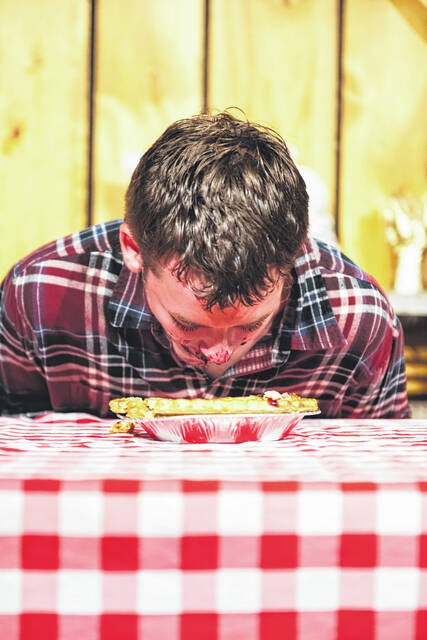 Robert Coffey in a pie eating contest.
                                 Tori Steyne for The Newberry Observer