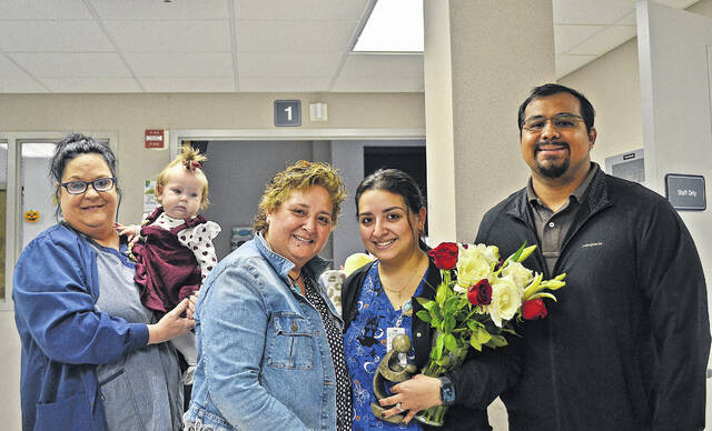 L-R: Julie Ammons, CCT; Baby Elora; Laura Mony Sanchez; Claudia Sanchez, RN; Adrian Sanchez.
Courtesy of NCMH