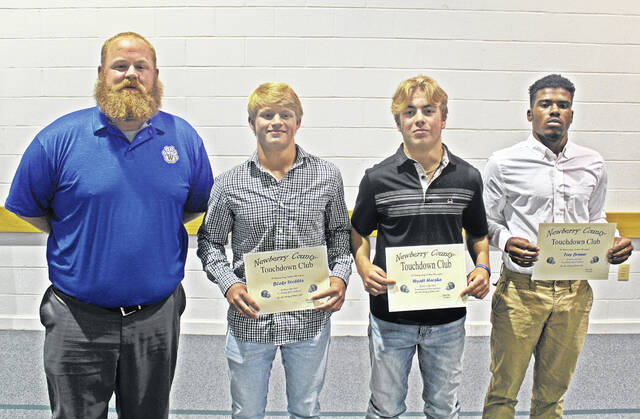The October Newberry County Touchdown Club Players of the Month from Whitmire High School, left to right: Head Coach Andrew Campbell, Blake Stribble (offensive), Wyatt Harsha (special teams), Trey Brewer (defensive).