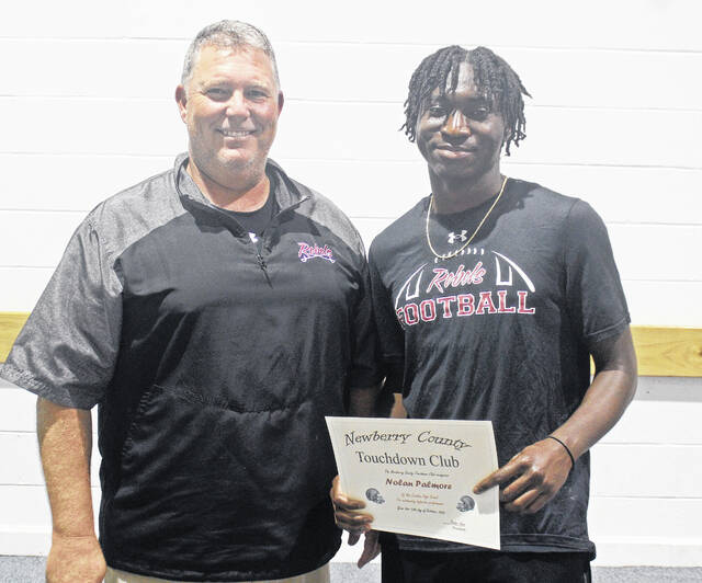 The October Newberry County Touchdown Club Players of the Month from Mid-Carolina High School, left to right: Head Coach Chris Arnoult and Nolan Palmore (defensive). Not pictured, Anthony Wicker (offensive) and Zylan Agnew (special teams).