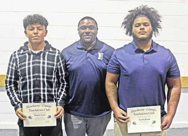 The October Newberry County Touchdown Club Players of the Month from Newberry High School, left to right: Daniel Teran (special teams), Head Coach Cedric Jeter, Tyrell Brown (defensive). Not pictured, ODareon Robinson (offensive).