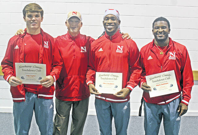 The October Newberry County Touchdown Club Players of the Month from Newberry College, left to right: Luke Taylor (defensive), Head Coach Todd Knight, Chico Onyekwere (special teams), Mario Anderson (offensive).