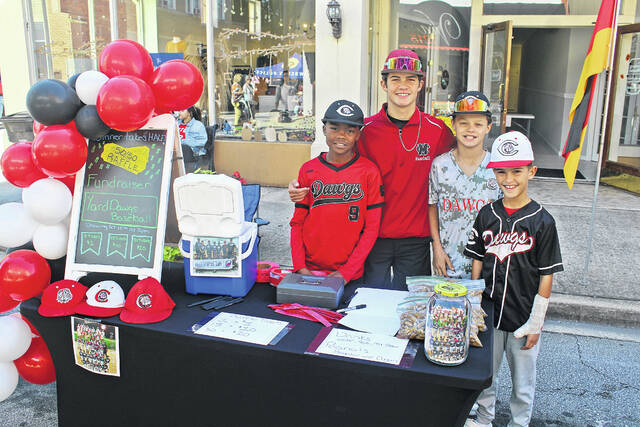 The Yard Dawgs raising money for baseball.
                                 Andrew Wigger | The Newberry Observer