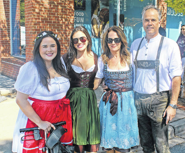 The Rhodes, of Columbia, dressed up for the occasion.
                                 Andrew Wigger | The Newberry Observer