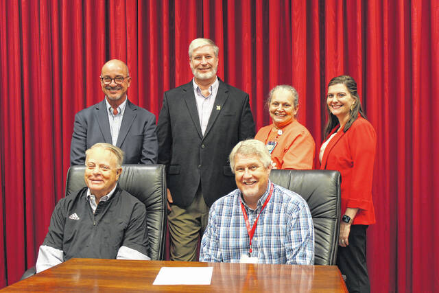 129052262_web1_Partnership
Officials from Newberry College and J.F. Hawkins & Springfield Place sign the clinical partnership agreement on the college campus. Standing: Jerry Alewine,Sid Parrish, vice president for academic affairs, Angie Eichman, and Jenny Lindler, director of nursing at Newberry College. Sitting: Maurice Scherrens, president of Newberry College, and Ty Ransdell.
Courtesy of Newberry College