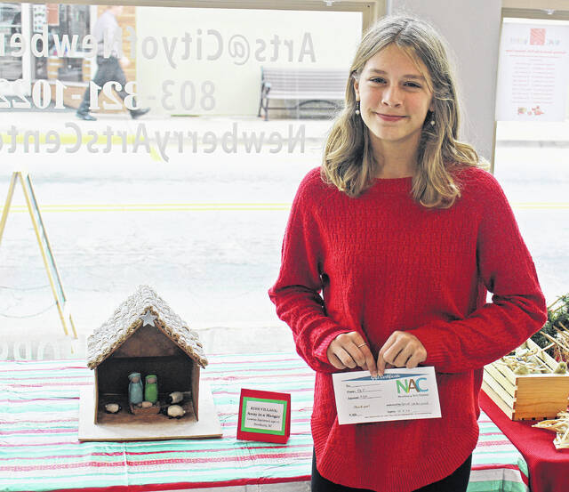 Lauren Raymond tied for first place in the Kids Village contest with Away in a Manger.
                                 Andrew Wigger | The Newberry Observer