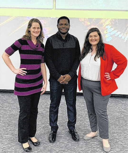 Lindsy Boateng, Daniel Oluwarotimi and Kimberly Fuhrman at the SCICU Symposium on Feb. 16, 2023.