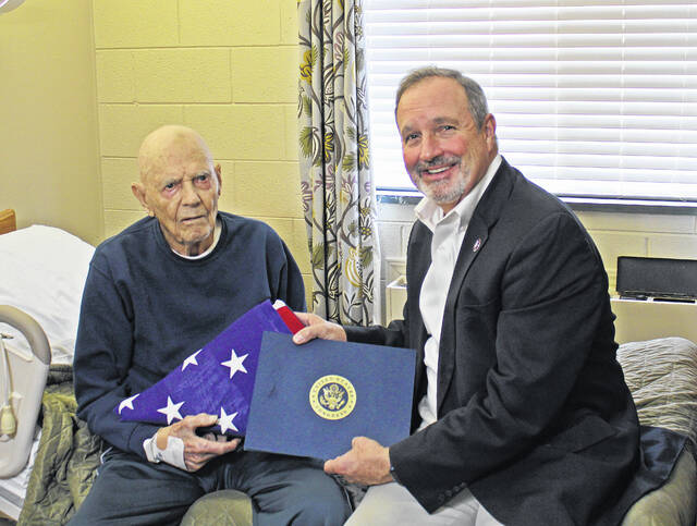 129390210_web1_IMG_1265--1-
Congressman Jeff Duncan (right) presents Henry Buddy Kunkle (left) with a flag that flew over the U.S. Capitol in his honor.
Dylan Francis | The Newberry Observer
