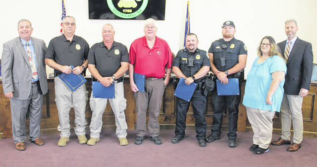 Newberry County Council recognized employees for years of service to Newberry County during their last meeting. Pictured, left to right: Councilperson Todd Johnson, Pete Johnson, Wesley Boland, Christopher Wells, Dalton Reynolds, Daniel Claytor, Rebecca Graham, Council Administrator Jeff Shacker.