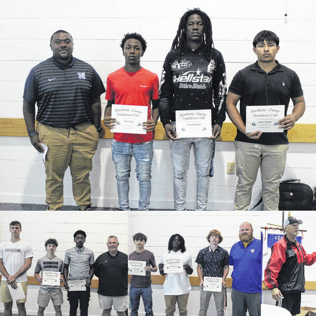 130900413_web1_TouchdownClubMeeting1
Student-athletes from Mid-Carolina, Newberry and Whitmire High School along with Wolves head coach Todd Knight.
Greg Hollis | gholis@www.newberryobserver.com