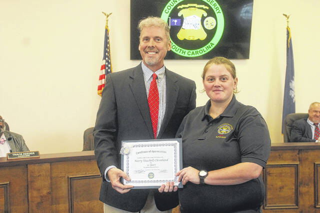 130993947_web1_Cleveland
Mary (Rachel) Cleveland was recognized during last weeks County Council meeting for her 10 years of service with the Newberry County Sheriffs Office. Cleveland is pictured with County Administrator Jeff Shacker.
Kelly Duncan photos | The Newberry Observer