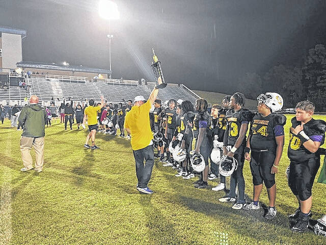 131049960_web1_MiddleSchoolChampionship
Newberry Middle School football team and head coach Troy White celebrates championship.
Courtesy of Newberry Middle School Athletics