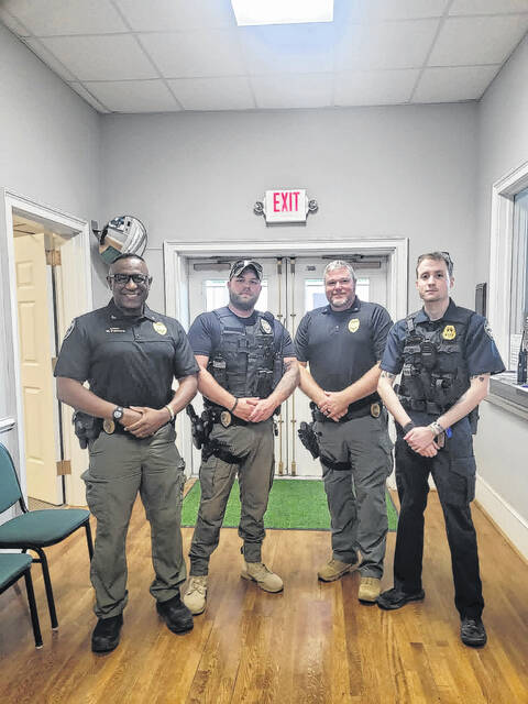 131550946_web1_download
Hampton Smith, second from left, recently joined the Prosperity Police Department as their newest officer.
Courtesy photo