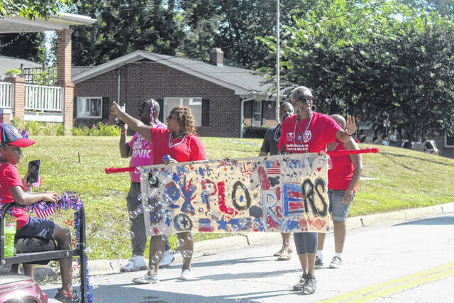 131615502_web1_Harper-6
The parade gives the community a chance to show off their best patriotic signs and rides just like this photo from last years parade.
Newberry Observer file photos