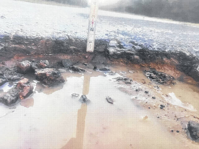 131737581_web1_Road-1
The cause of potholes is due in part to the standing water that is not able to run off properly, not from the constant traffic.
File photo