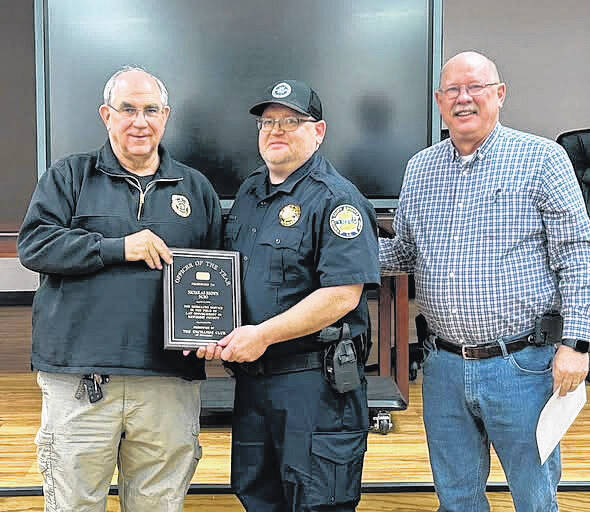 132149937_web1_NCSO-Brown
Nick Brown, center, was recently named Exchange Club Law Enforcement Officer of the Year. Sheriff Lee Foster said Brown is a great ambassador for the Sheriffs Office and the School District of Newberry County.
Courtesy photo