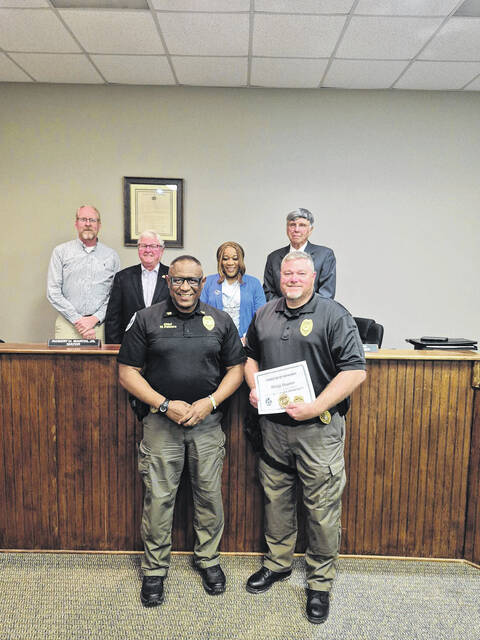 Prosperity Police Chief Wesley Palmore, left, recognized Philip Hunter, right, on his recent promotion to Lieutenant with the Prosperity Police Department. Palmore and Hunter are pictured with members of Prosperity Town Council.
                                 Courtesy photos