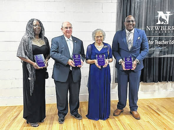Four community leaders were recognized during a banquet hosted by the Omicron Lambda Sigma Chapter of Phi Beta Sigma Fraternity - those leaders were Earlean Williams Boles, Freddie Chalmers, Sandra Elizabeth Davis Riley and Newberry County Sheriff Lee Foster.
                                 Courtesy photo