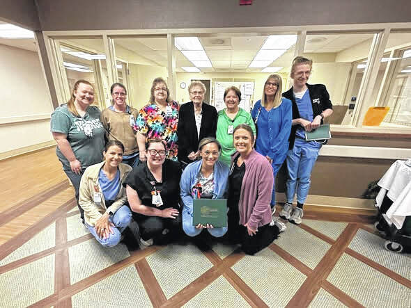 Jackson, front row - center, was nominated by a patient who was grateful for the care she provided when she was a patient at Newberry Health.
                                 Courtesy photos
