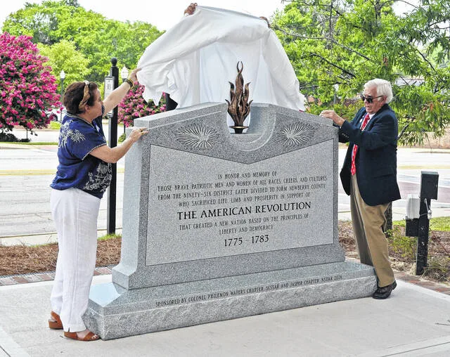 The monument is officially unveiled.
Andrew Wigger for The Observer