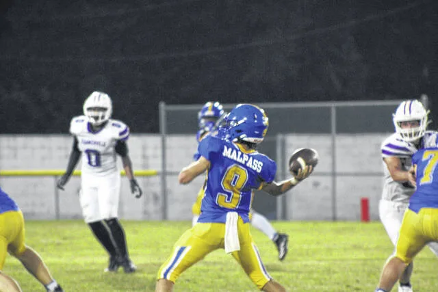 Malpass, Wulf set school records as Wolverines grab their first win in 2026